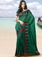 Тёмно-зелёное индийское сари из натурального индийского шёлка в горошек, украшенное контрастными лентами и геометрическим орнаментом по краю