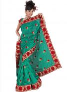 Яркое сине-зеленое индийское сари из натурального индийского шёлка, украшенное вышитыми цветочными принтами, с бежевым бордюром, украшенным красным вышитым цветочным узором