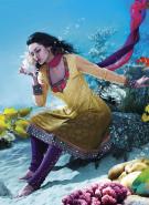 Жёлтое красивое платье из парчи и шифона, с длинными рукавами