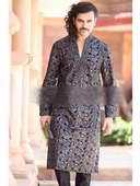 Чёрный мужской индийский национальный костюм из бархата, украшенный вышивкой скрученной шёлковой нитью, стразами и бисером