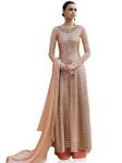 Бежевое длинное платье «в пол» из гипюра, с длинными рукавами, украшенное пайетками