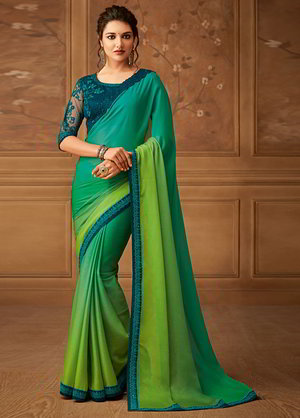 Зелёное шифоновое индийское сари, украшенное вышивкой шёлковыми нитями, вышивкой люрексом