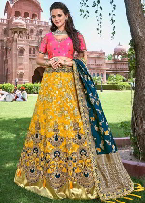 Жёлтый шёлковый индийский женский свадебный костюм лехенга (ленга) чоли, украшенный вышивкой