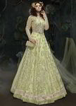 Светло-зелёное длинное платье в пол, с длинніми рукавами, украшенное вышивкой