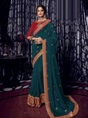 Зелёное индийское сари из шёлка, украшенное вышивкой люрексом, скрученной шёлковой нитью со стразами