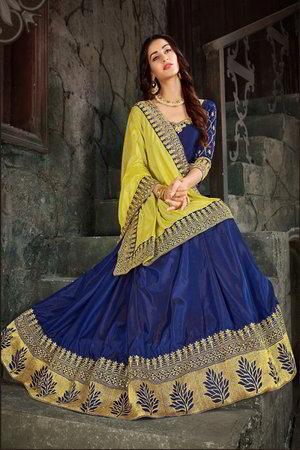 Жёлтое и синее шёлковое индийское сари, украшенное вышивкой