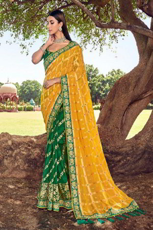 Жёлтое и зелёное индийское сари из шёлка, украшенное вышивкой