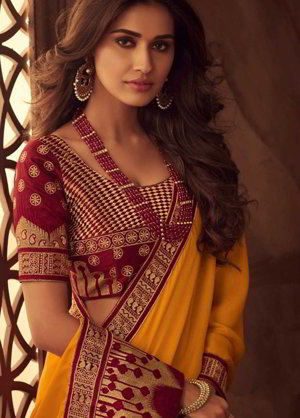 Горчичное и жёлтое шёлковое индийское сари, украшенное вышивкой