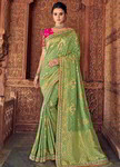 Светло-зелёное нарядное индийское сари, украшенное вышивкой с люрексом