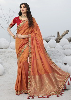 Тёмно-оранжевое и бордовое жаккардовое и шёлковое индийское сари, украшенное вышивкой