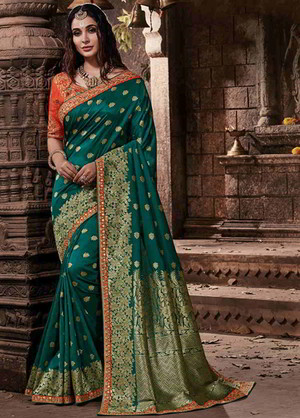Тёмно-зелёное индийское сари из шёлка, украшенное вышивкой люрексом