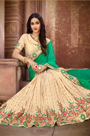 Зелёное и кремовое шёлковое индийское сари, украшенное вышивкой