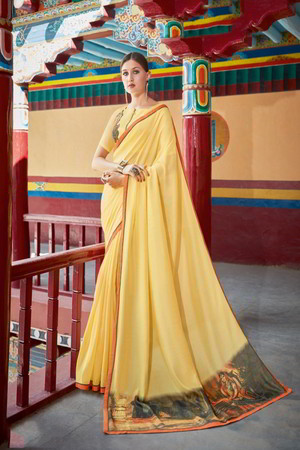 Жёлтое шифоновое индийское сари, украшенное вышивкой
