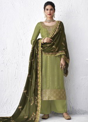 Светло-зелёное шёлковое платье / костюм, украшенное вышивкой