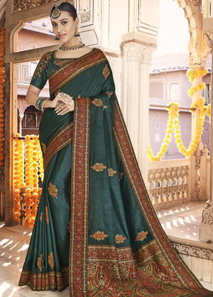 Зелёное парчёвое и шёлковое индийское сари, украшенное вышивкой люрексом