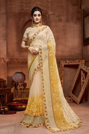 Жёлтое и кремовое индийское сари из фатина, украшенное вышивкой