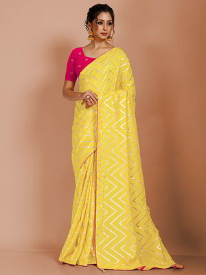 Жёлтое индийское сари из шёлка, украшенное вышивкой люрексом